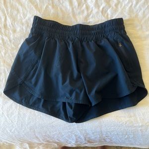 Lululemon Track That 4 inch- NAVY- size 10